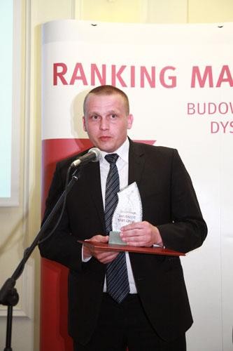 Marcin Masny z firmy Soudal z nagrodą - Złotą Budowlaną Markę Roku 2012 w kategorii Piany