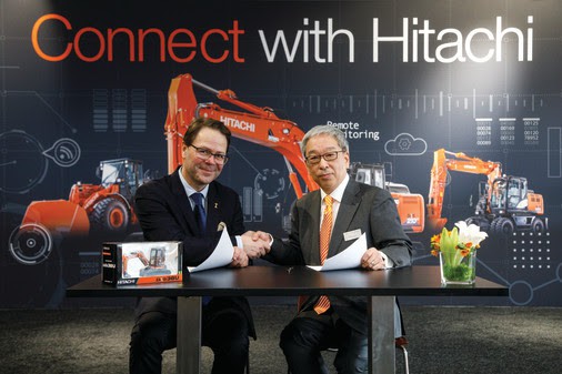 Morten Strand, Dyrektor Generalny ABAX oraz Tom van Wijlandt, Dyrektor ds. rozwoju biznesu Hitachi Construction Machinery Europe. Fot. ABAX
