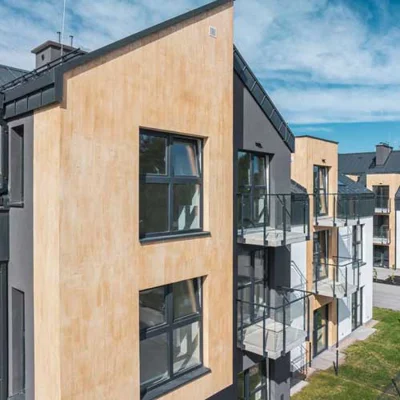 Funkcja i ekspresja w nowoczesnej architekturze,  czyli jak tynk modelowany zmienia elewacje w dzieła sztuki